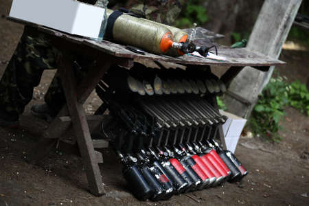 professional paintball equipment in a summer camp
