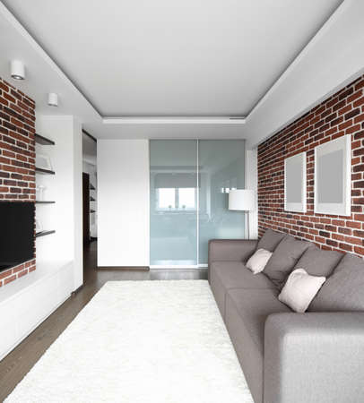 big and bright interior of modern living roomの写真素材
