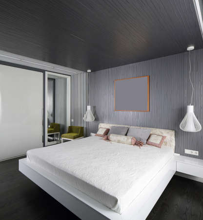 bright and brand new interior of european bedroomの写真素材
