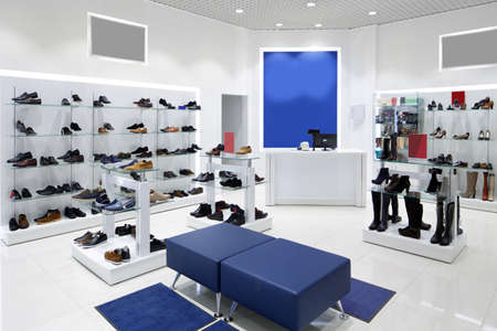 bright and fashionable interior of shoe store in modern mallの写真素材
