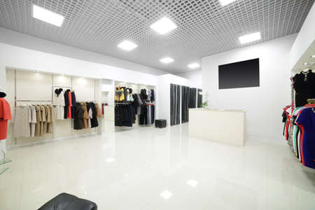 luxury and fashionable brand new interior of cloth storeの写真素材