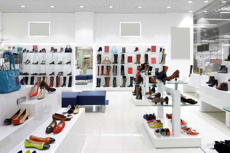 bright and fashionable interior of shoe store in modern mallの写真素材