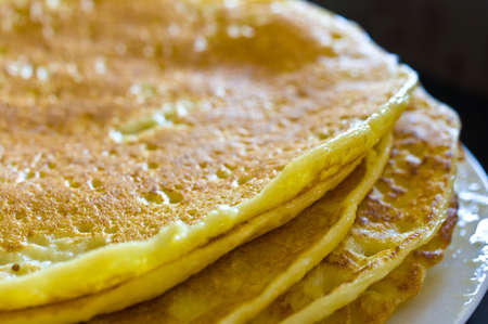 Detail of a pile of pancakes with short depth of field.の写真素材