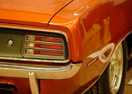 auto,automobile,car,chrome,detail,drive,headlight,muscle,polish,shape,show,sport,vehicle,vintage,wheel,orange,backlight,redの写真素材