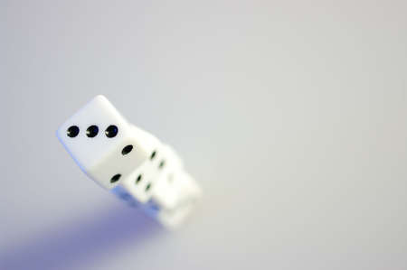A stack of dice viewed from above, focus on top.の写真素材