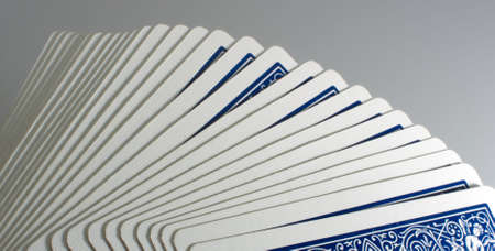 Back of blue playing cards in an neutral environment.の写真素材
