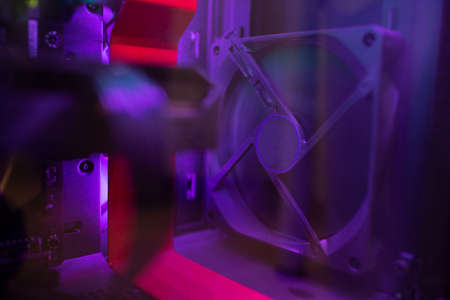 A fan inside the computer. Beautiful lighting. Technical background.の写真素材
