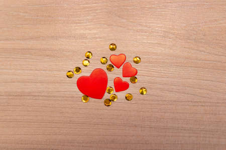 Hearts on a wooden background. Valentine's Day or Mother's Day greeting card. High-quality photo.の写真素材