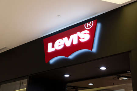 Moscow, Russia - October 2, 2021. Levis store in Vegas mall. Close-up logo. Levi Strauss Co - well-known manufacturer of clothing and footwear in the USA.のeditorial素材