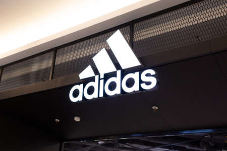 Moscow, Russia - October 2, 2021. Adidas store in Vegas mall. Close-up logo. German multinational...