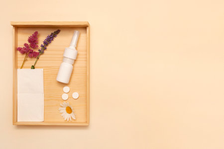 Seasonal allergy. Spring bloom allergy. Nasal spray medical mask flower and pills. Flat lay. Copy...