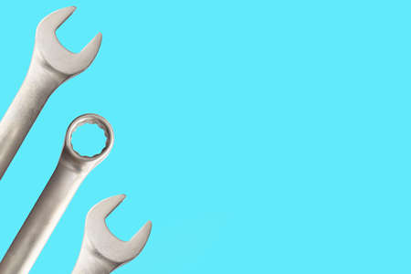 Wrench on a blue background. Tools for repair. flat lay. top view. copyspace. Place for text.