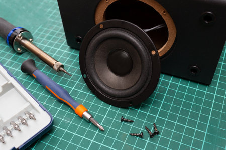 Tools for repairing a broken music speaker. Equipment repair service.