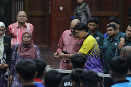 A group of Muslim people attending a religious ceremony.の写真素材