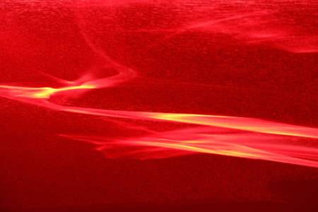 A beautiful photophone painted with a red laser as a result of light refraction.の写真素材