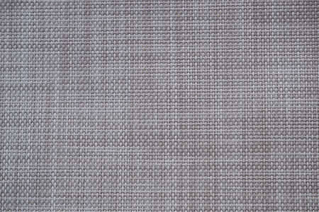 Beige mat of dry wicker fiber as texture, background.の写真素材