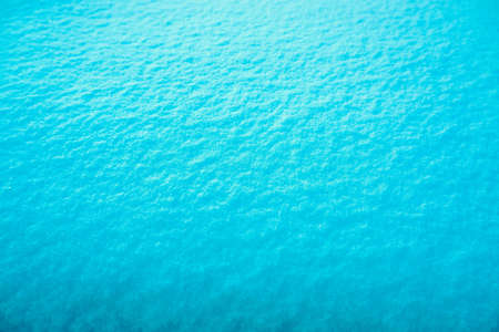 Colored snow as a background. Turquoise backgroundの写真素材