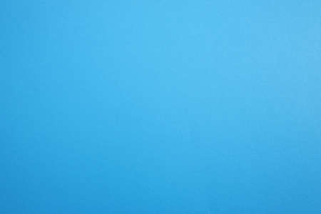 Paper, cardboard background. High resolution paper texture. Colored Blue background.の写真素材