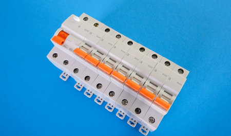 Automatic differential current switch and circuit breakers on a blue background. Electrical engineering concept.の写真素材