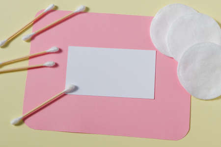 Background from colored sheets of paper. Hygienic Top view, flat lay. Place for your text. Makeup...
