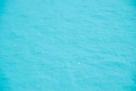 Colored snow as a background. Turquoise backgroundの写真素材