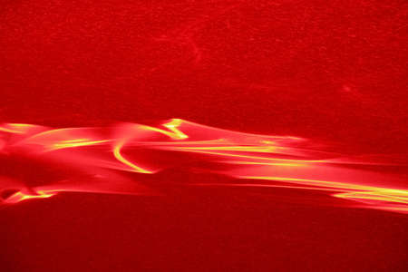 A beautiful photophone painted with a red laser as a result of light refraction.の写真素材