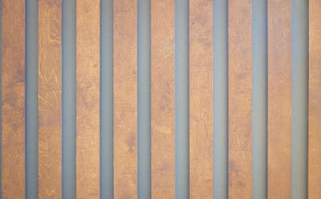 Brown wooden vertical plank. Texture of wood covered with oil Wood vertical texture background brown...