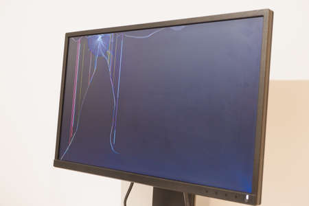 Broken LCD monitor. Cracked IPS Screen. Broken screen of a liquid crystal display, computer monitor.