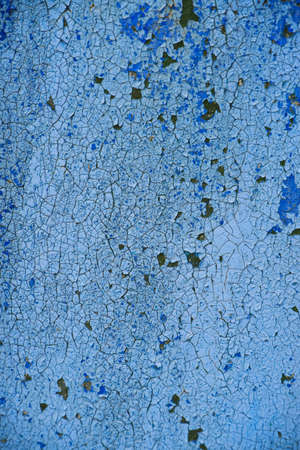 Natural painted wood background. The texture of a shabby board painted with blue paint.の写真素材