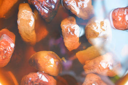 Dried fruit compote. compote with dried fruits from apples and pears close-up