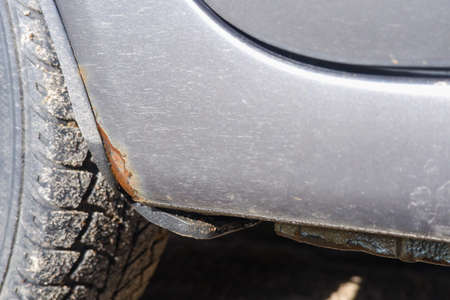 Corrosion, rust on the car body. car with Rust and Corrosion and paint bitumen. The concept of harm...
