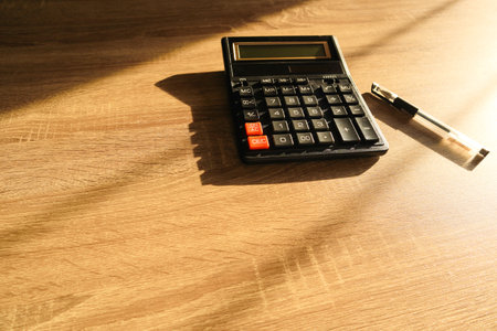 Calculator and pencil. office desk table with supplies. Flat lay Business workplace and objects....