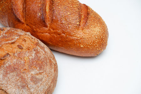 Close Up Of Bread On White Background. Healthy baked bread, whole bread on white background.