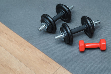 fitness concept. Sport mat, dumpbells. Active lifestyle sport. Workout at home or gym web banner.の写真素材