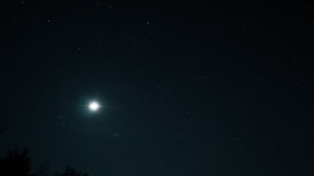 starry night sky and full moon. Background of the beautiful dark blue starry sky and bright star.の写真素材