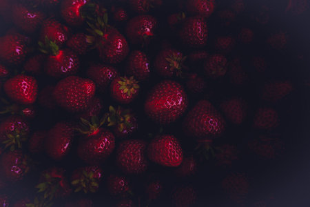Red strawberry background. Fresh organic berries macro. fruit backgroundの写真素材