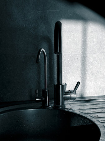 Dripping Faucet with Water Drop. Stainless steel, faucet with water drippingの写真素材