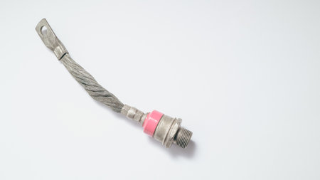 Electronic component: big heavy power rectifier diode with screw for mounting on heatsink on white background. Electrical engineering.の写真素材