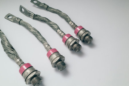 Electronic component: big heavy power rectifier diode with screw for mounting on heatsink on white background. Electrical engineering.の写真素材