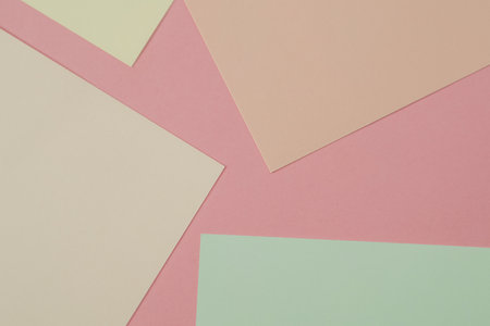 Abstract geometric colored paper background. Delicate pastel colors. Abstract pattern with soft...