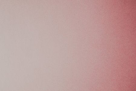 Light gradient paper backdrop. Pastel pink color. Textures formed by cardboard or paper ancient of...