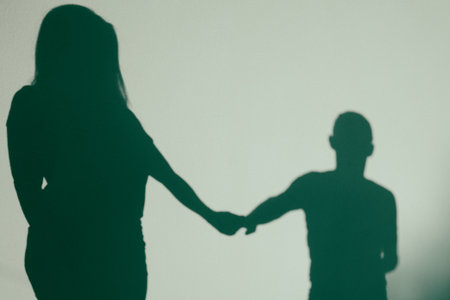 Silhouette of a couple embracing. Silhouette shadows of people. Man and woman couple lovers...