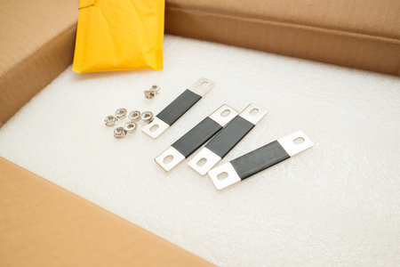 Bus bar Lithium LiFepo4 rechargeable battery module ready to connect. Electrical bus on white...