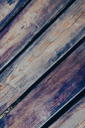 Weathered brown wood board textured background. Vintage wooden backdrop. The surface of weathered brown wood texture.の写真素材