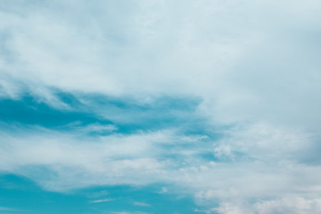 White clouds against blue sky background. Blue sky with cirrus clouds panorama. Cirrus Cloudscapesの写真素材