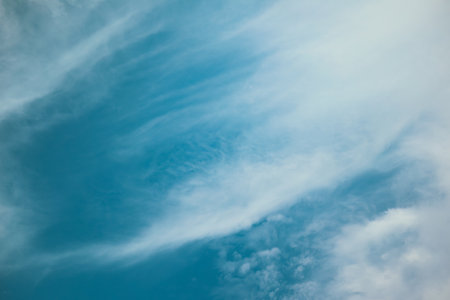 White clouds against blue sky background. Blue sky with cirrus clouds panorama. Cirrus Cloudscapesの写真素材