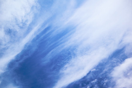 White clouds against blue sky background. Blue sky with cirrus clouds panorama. Cirrus Cloudscapesの写真素材