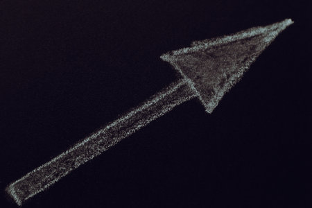 White Chalkboard Arrow. Arrow mark hand draw. Chalkboard.の写真素材