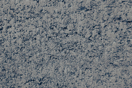 Scratched Stone Wall Texture. Concrete texture. Gray stone tile block background. Old grunge stone wall texture background.の写真素材