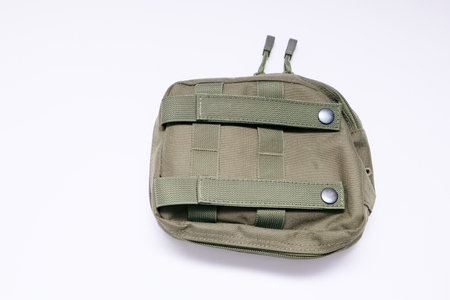 Fishing Tackle Storage Bag on White Background. Fishing bag with equipment on a white.の写真素材